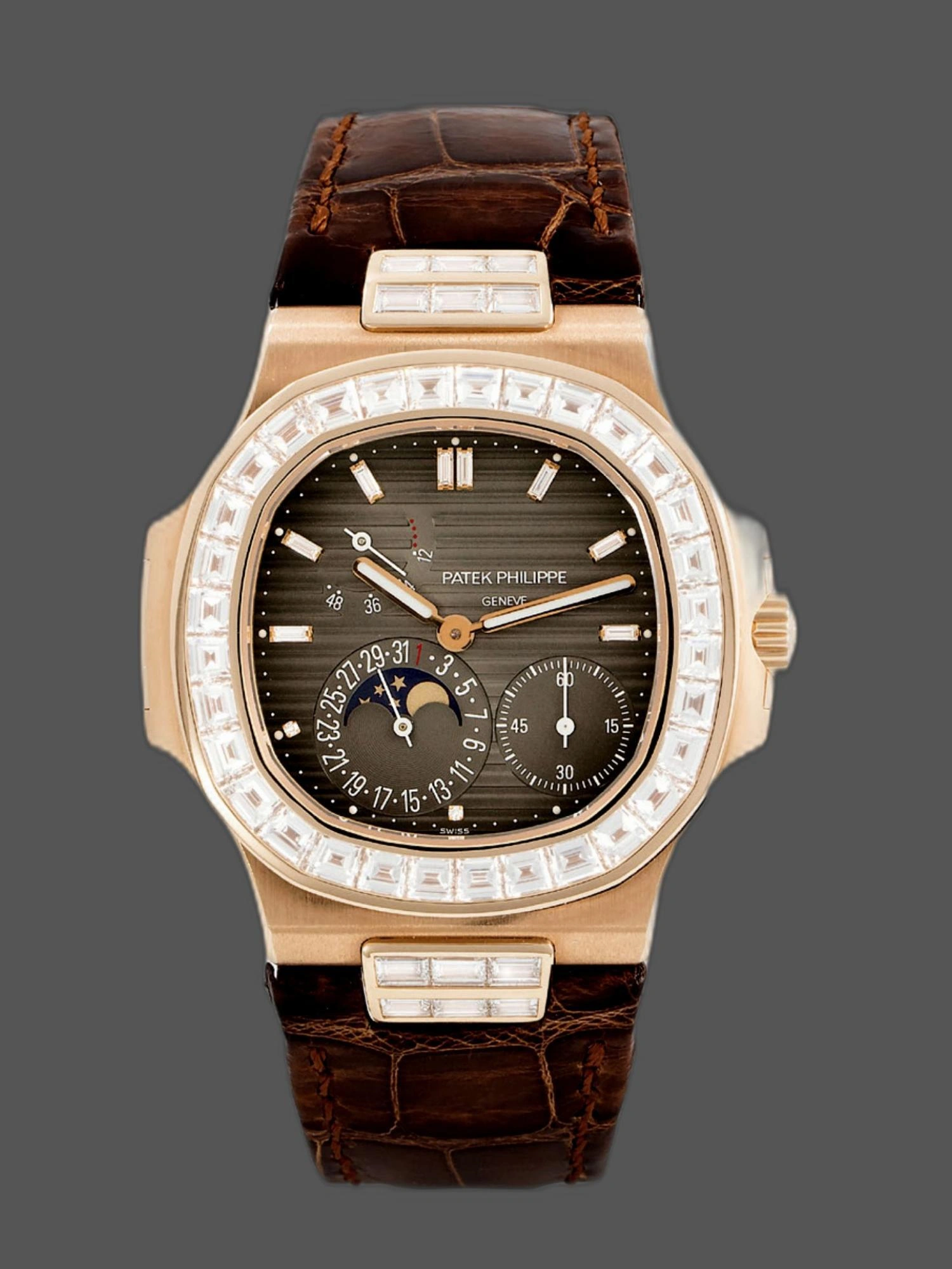 Front view of Patek Philippe Nautilus 5724/001 40mm showing baguette diamond bezel and brown dial.