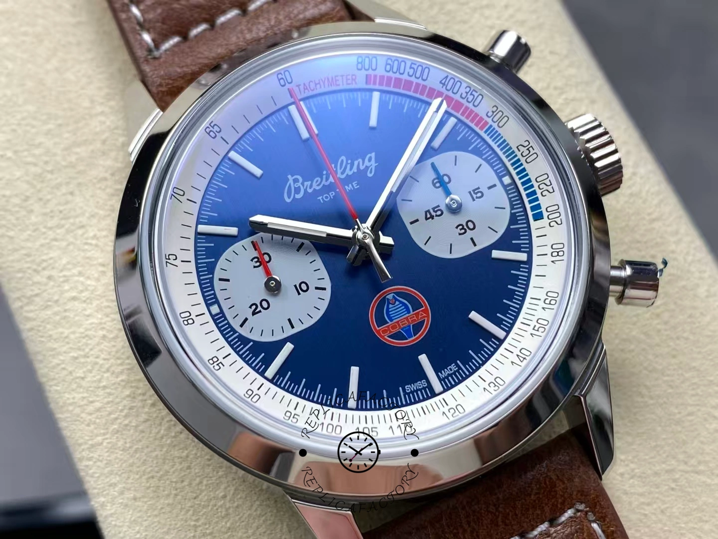 Detailed dial view of Breitling Top Time B01 Shelby Cobra AB01763A1C1X1 tachymeter scale.