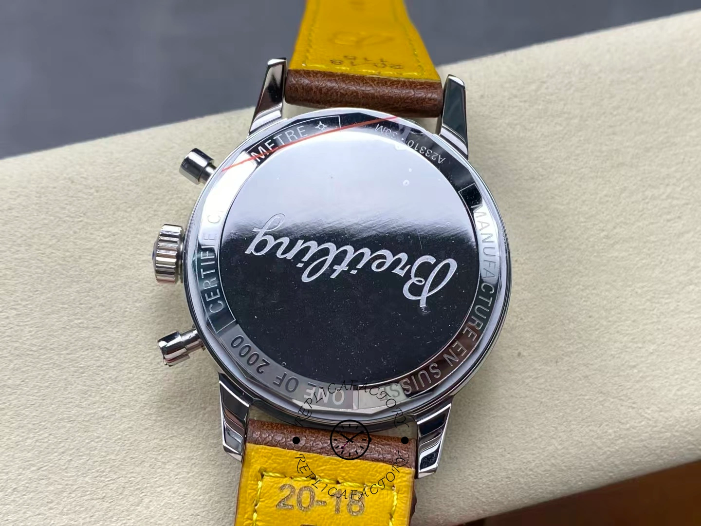 Caseback of Breitling Premier Top Time A23310121G1X1 with engraved Breitling logo.