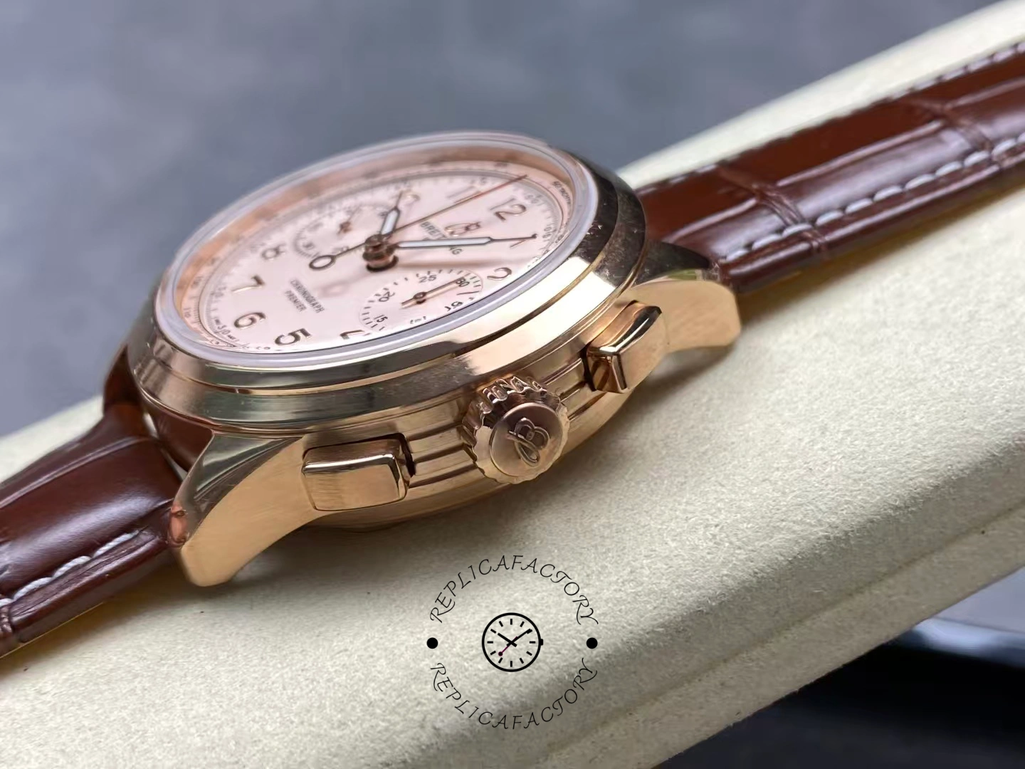 Side view of Breitling Premier B09 Chronograph RB0930371G1P1 showing crown and pushers.