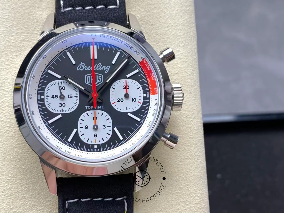 Close-up of Breitling Top Time B01 Deus Chronograph AB01765A1B1X1 black dial with red hand. - Front view