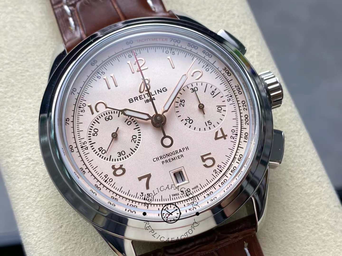 Full dial view of Breitling Premier B01 AB0145211G1P2 with chronograph hands and date window.