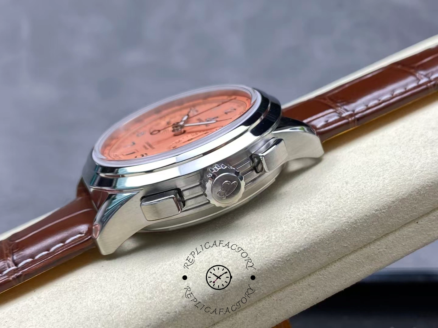 Side view of Breitling Premier B01 AB0145331K1P2 with crown and pushers in stainless steel case.