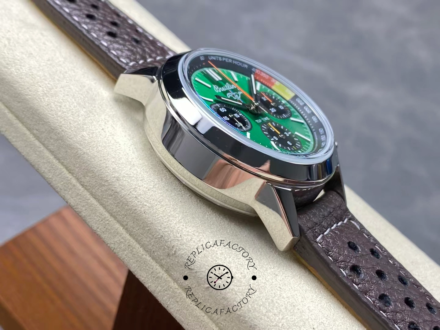 Left side polished case of Breitling Top Time B01 AB01762A1L1X1 with brown strap.