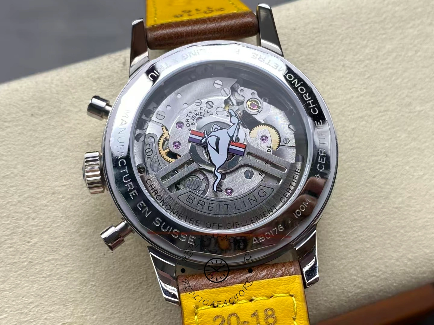 Exhibition caseback of Breitling Top Time Ford Mustang A253101A1L1X1 showing Mustang logo.