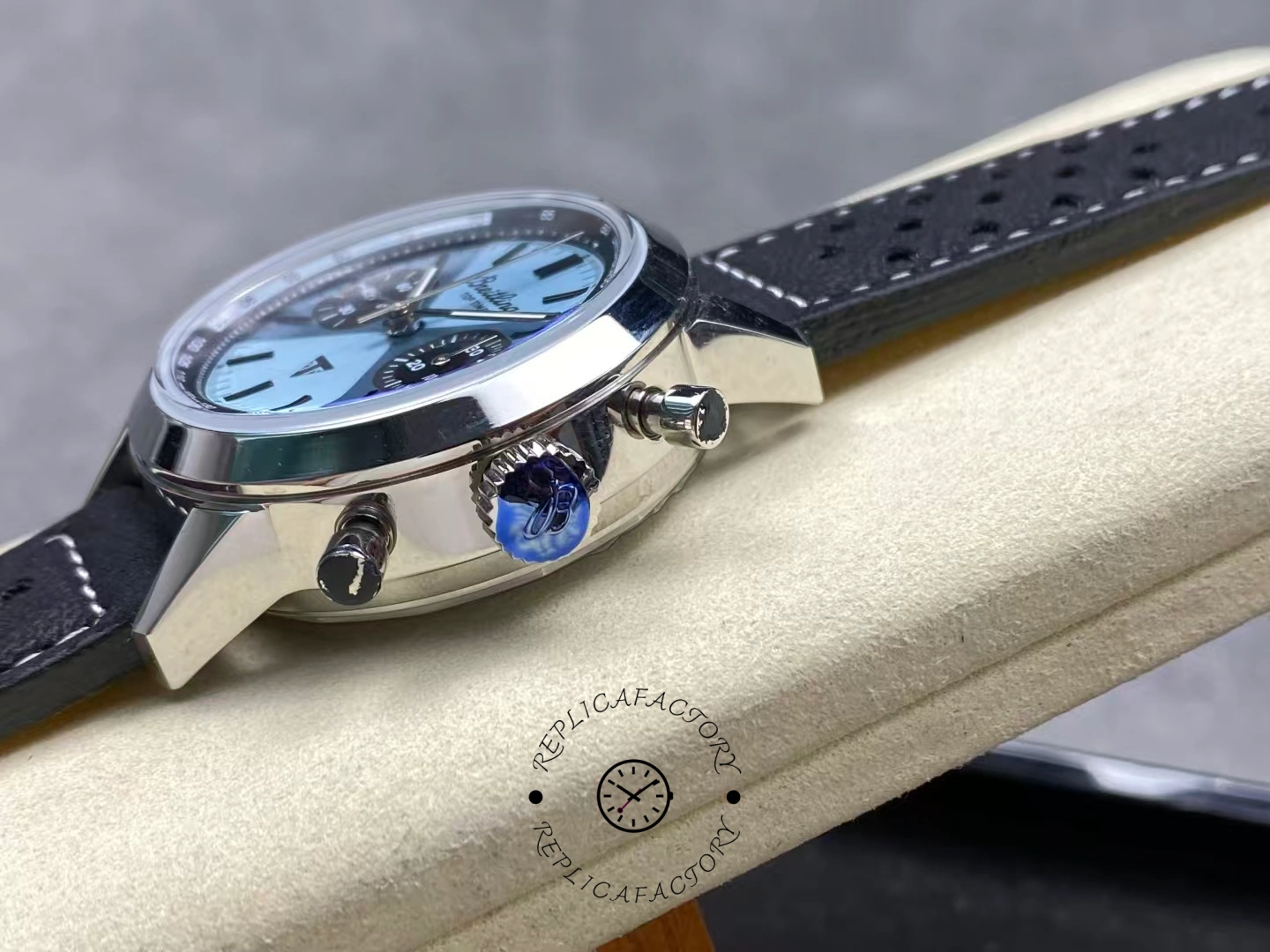 Side crown view of Breitling Top Time B01 Triumph AB017641C1X1 with pushers.