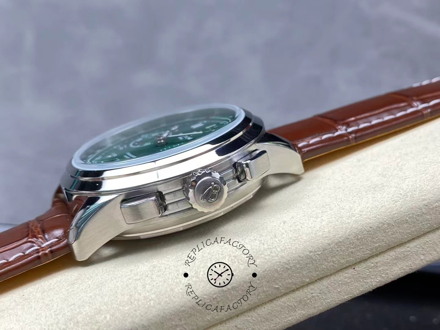 Side view of Breitling Premier B01 AB0145371L1P1 with crown and pushers on steel case.