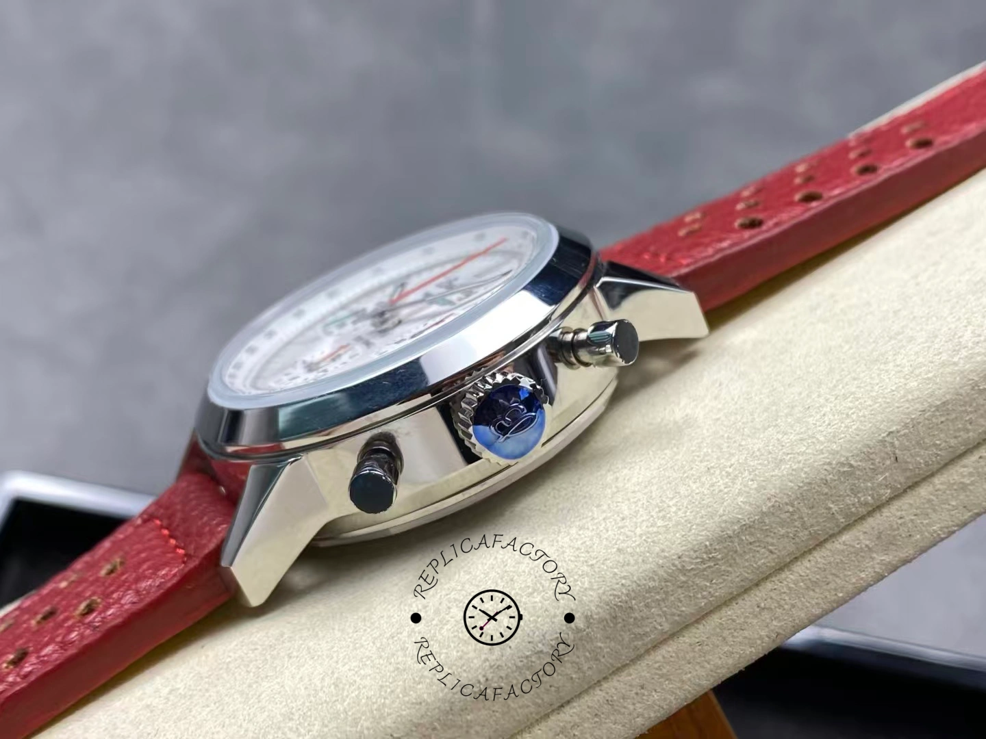 Side crown view of Breitling Premier B01 AB0176A71A1X1 with chronograph pushers.