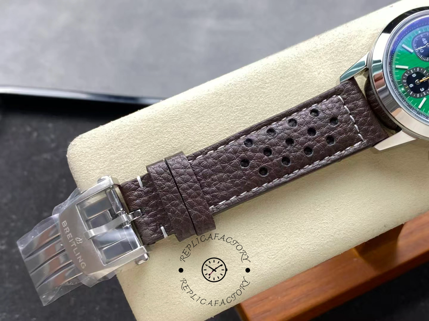 Buckle detail of Breitling Top Time B01 AB01762A1L1X1 with engraved logo clasp.