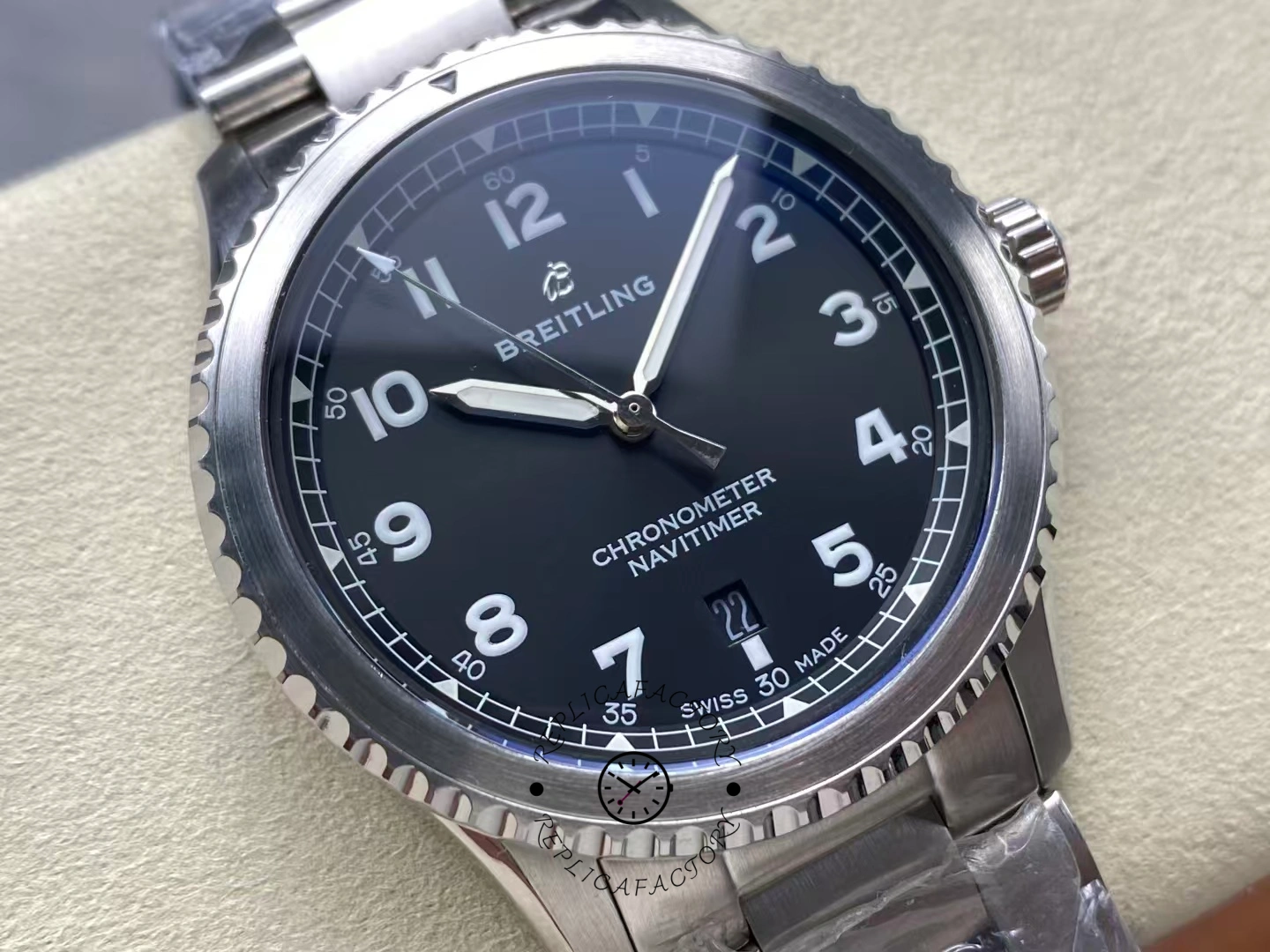 Detailed view of Breitling Navitimer 8 A17314101B1A1 showing hands and polished bezel.