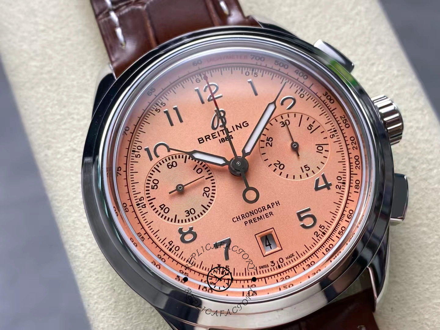 Macro close-up of Breitling Premier B01 AB0145331K1P2 copper dial with subdials and tachymeter.