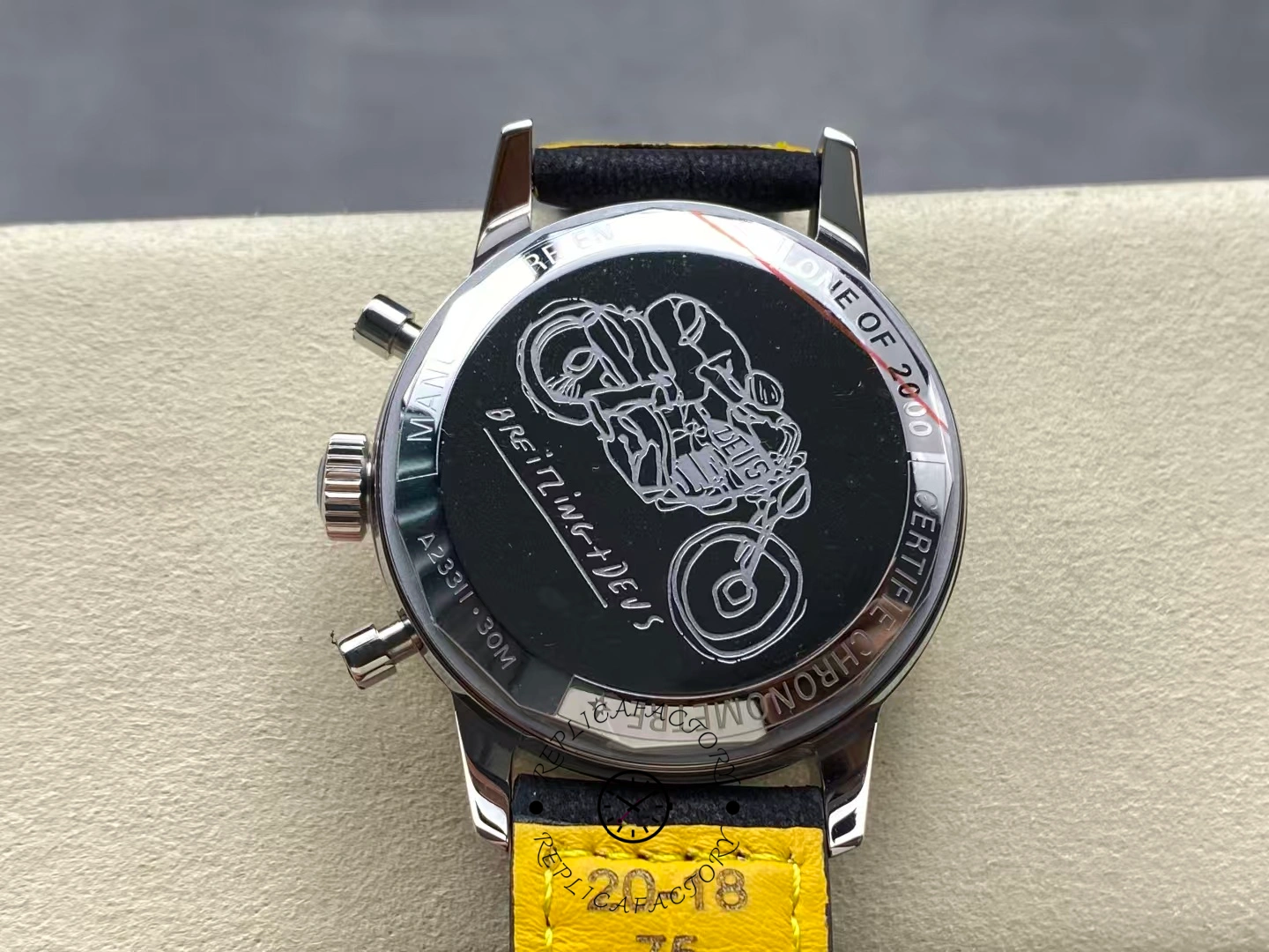 Caseback of Breitling Top Time Triumph A23311121C1X1 engraved with Triumph motorcycle.