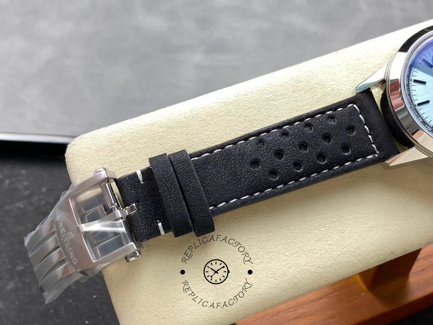 Buckle detail of Breitling Top Time B01 Triumph AB017641C1X1 with logo clasp.