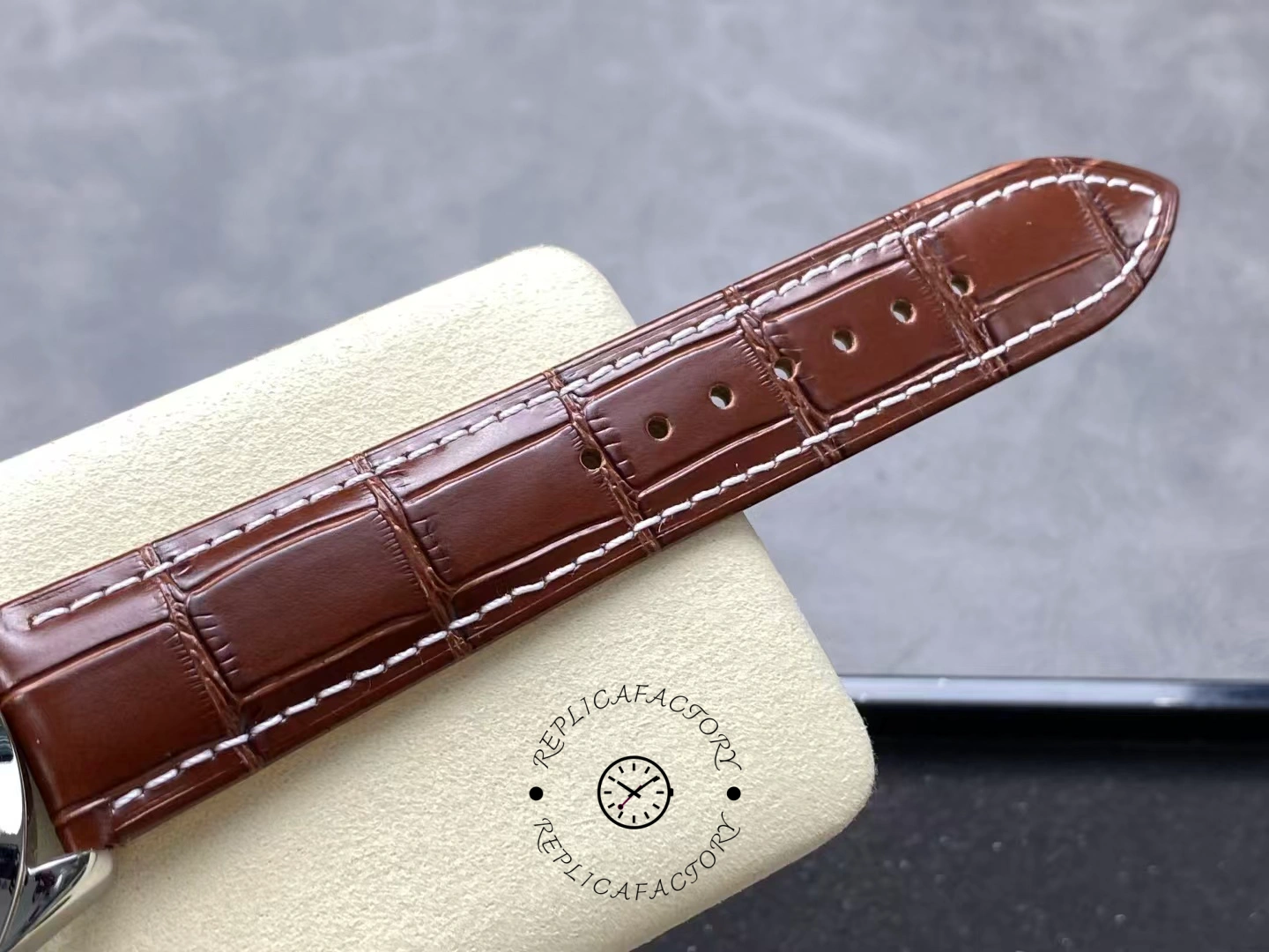 Leather strap detail of Breitling Premier B01 AB0145371L1P1 showing stitching and texture.