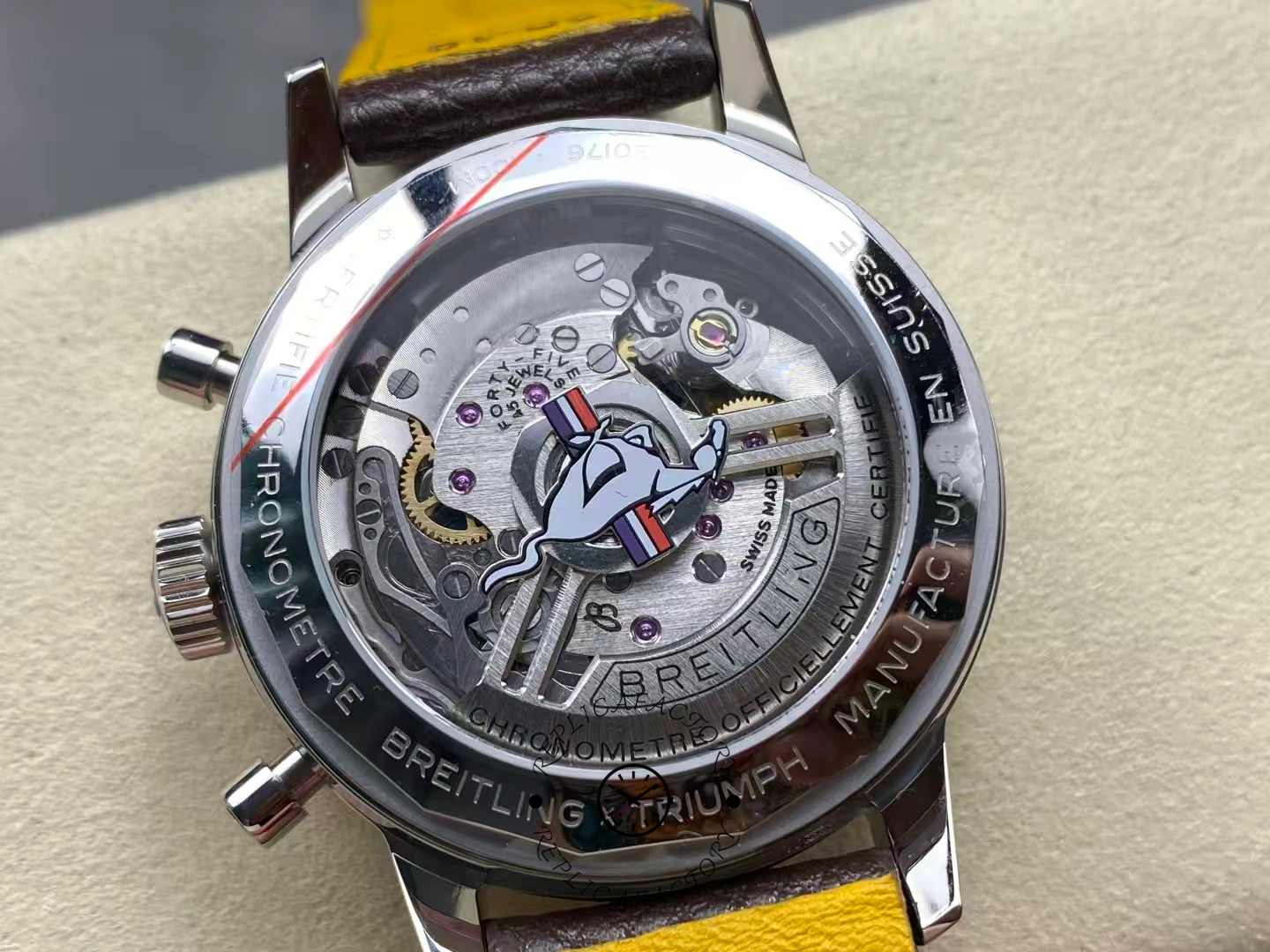 Caseback of Breitling Top Time B01 AB01762A1L1X1 with Mustang logo on rotor.