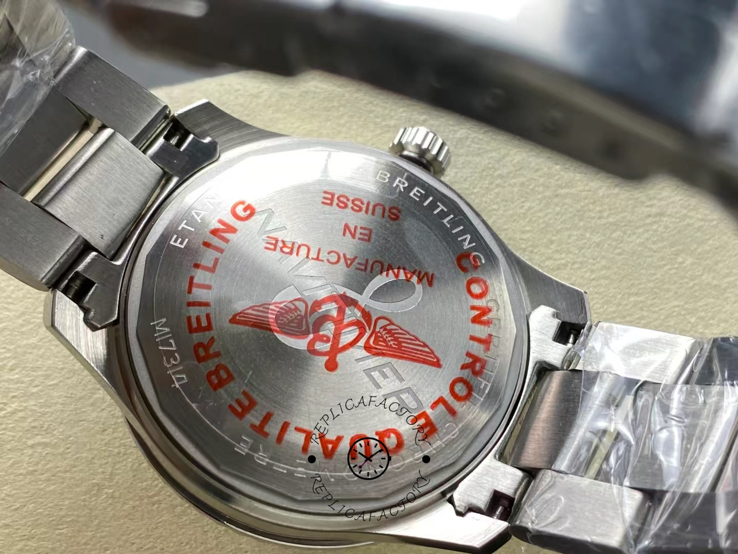 Caseback of Breitling Navitimer 8 A17314101B1A1 showing engraved Breitling logo.