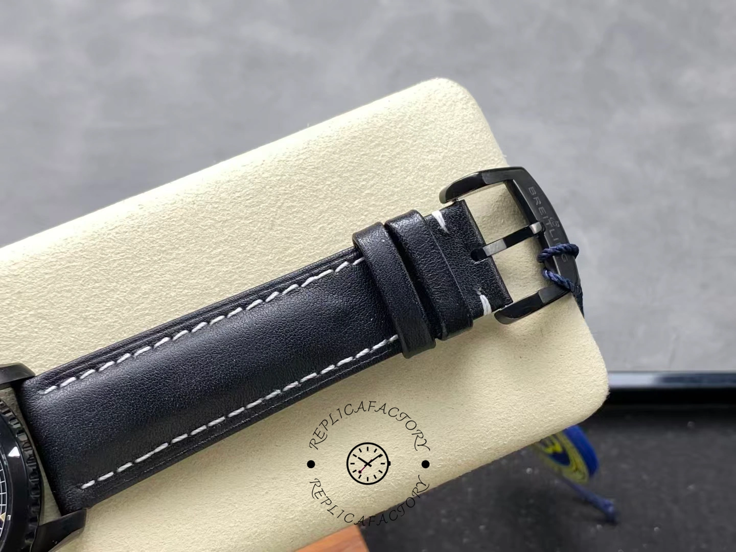 Buckle close-up of Breitling Navitimer 8 Automatic 41 M17314101B1X1 showing engraved logo.