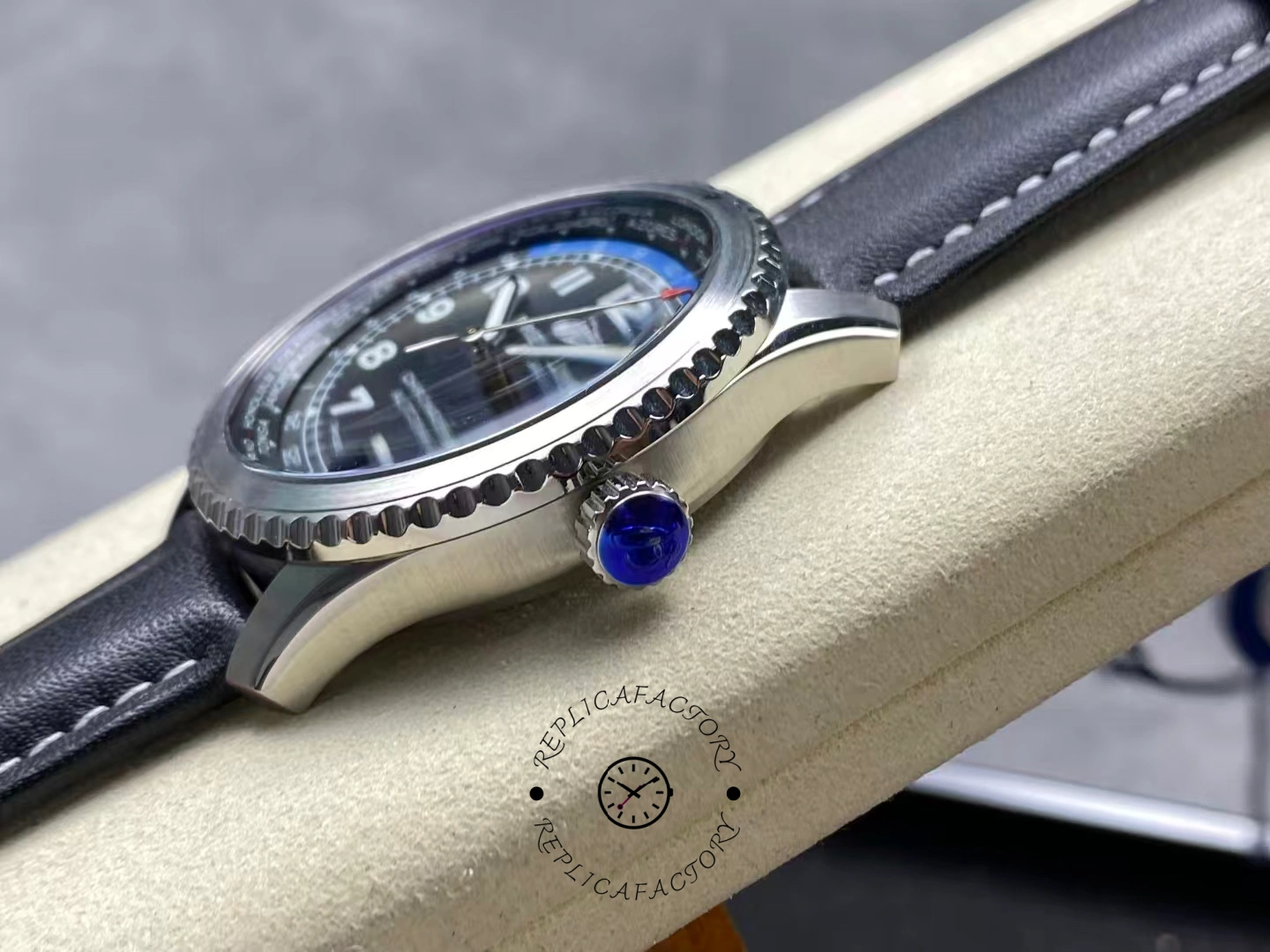 Side view of Breitling Aviator 8 B35 Unitime 43 AB3521U41B1P1 showing crown with blue logo.