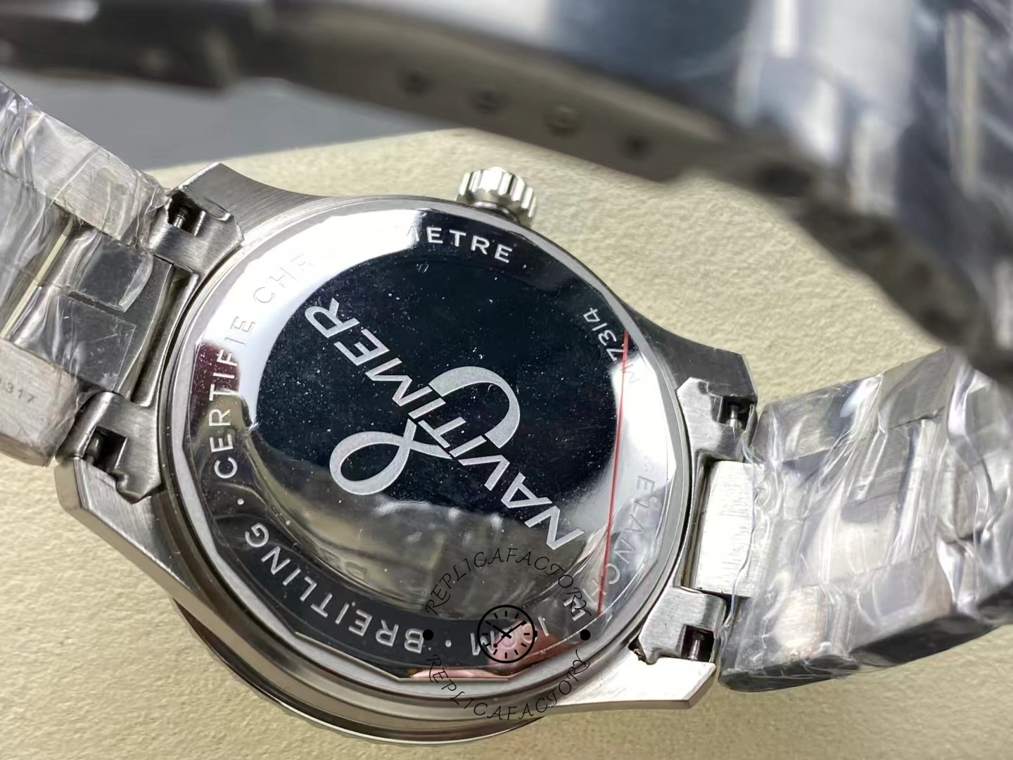 Caseback of Breitling Aviator 8 B35 AB3521U01G1A1 engraved with Navitimer certification text.