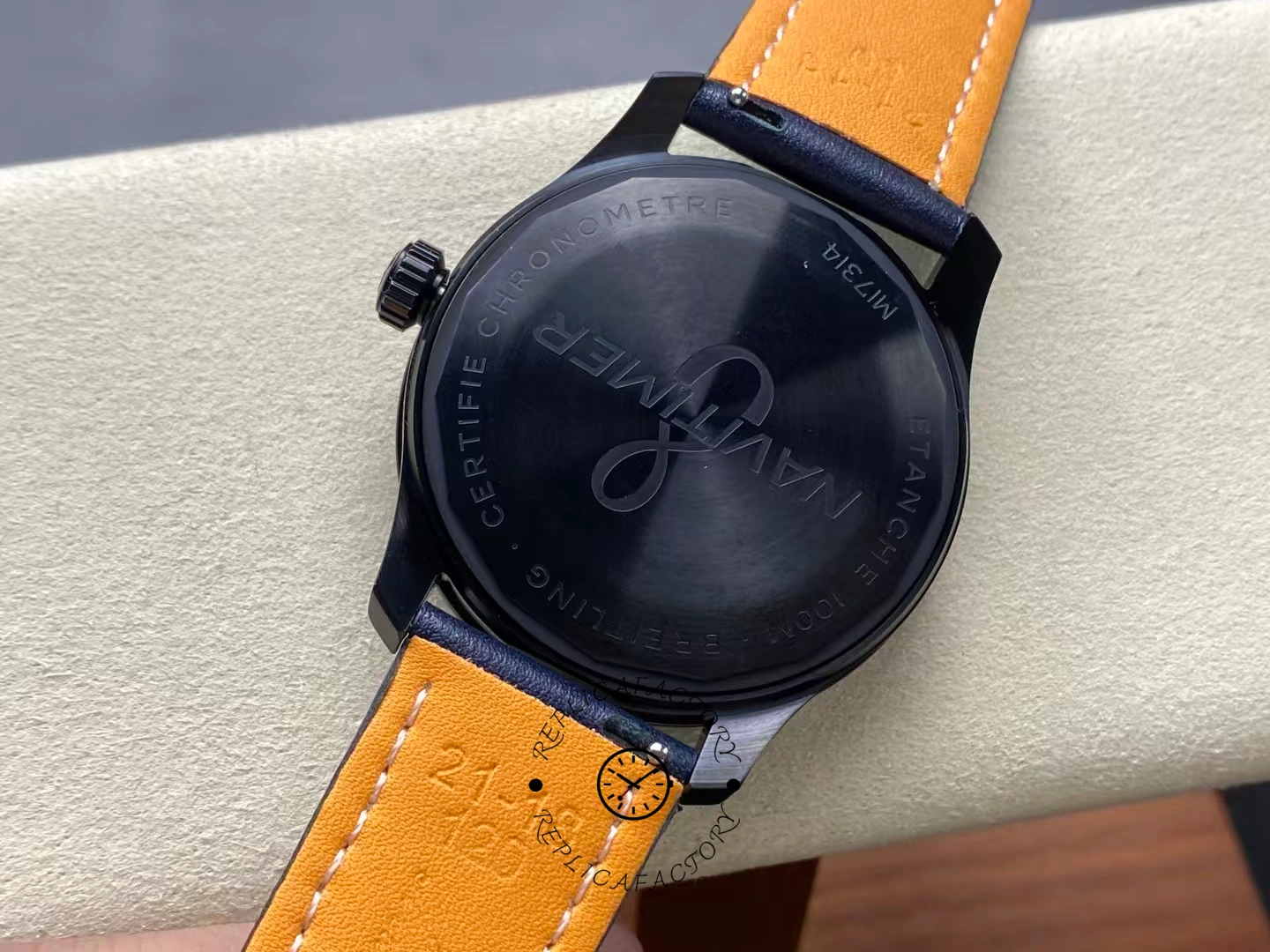 Caseback of Breitling Navitimer Aviator 8 M17314101B1X1 engraved with Navitimer logo.