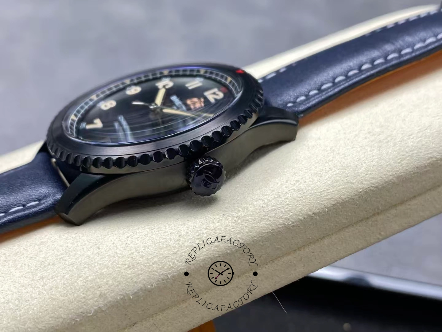 Side view of Breitling Navitimer Aviator 8 M17314101B1X1 showing black crown with logo.