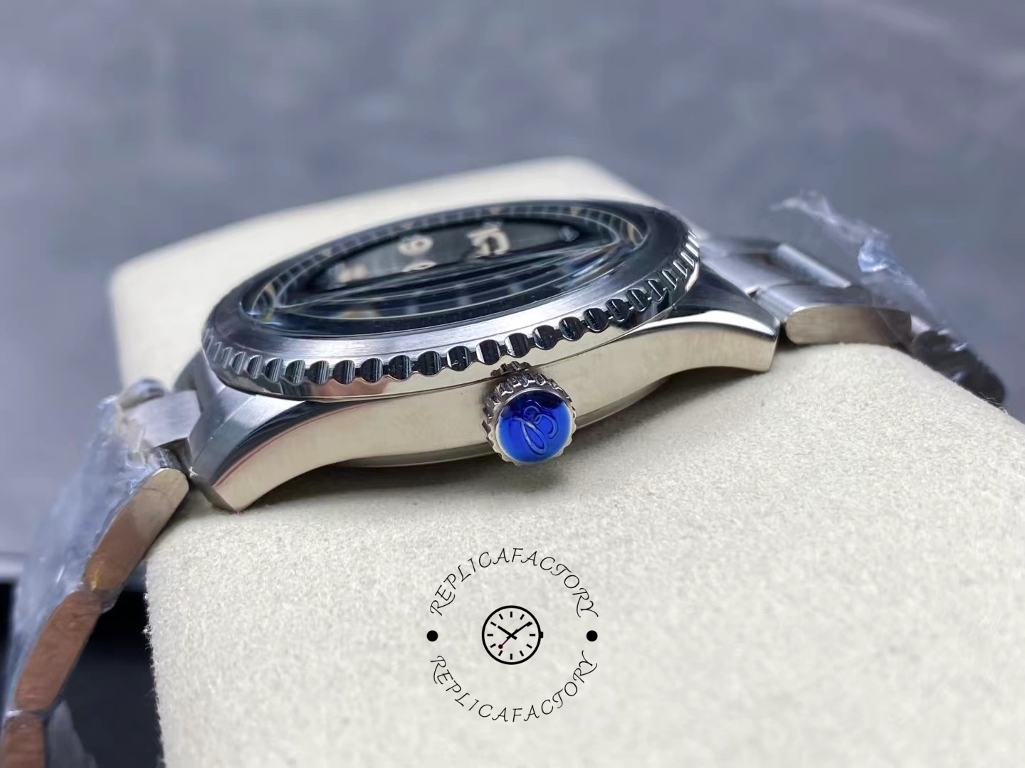 Crown side of Breitling Aviator 8 A17315101B1A1 showing blue logo crown and polished case.