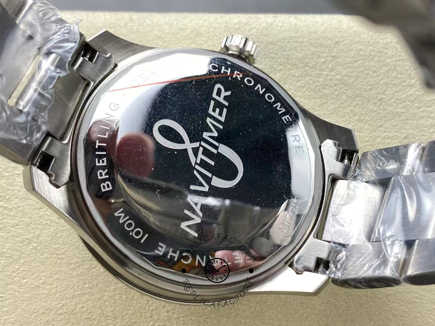 Caseback of Breitling Aviator 8 B35 AB3521U41B1A1 engraved with Navitimer certification text.