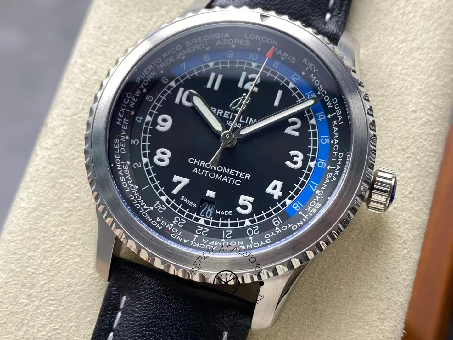 Close-up of Breitling Aviator 8 B35 Unitime 43 AB3521U41B1P1 showing city ring and black dial.