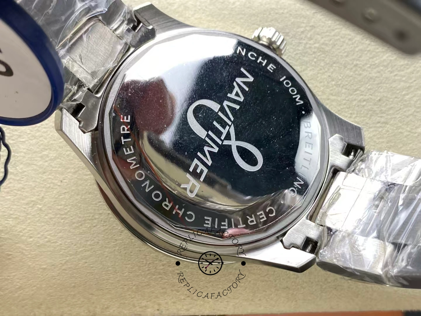 Caseback of Breitling Navitimer 8 A17314101C1A1 engraved with Navitimer logo.