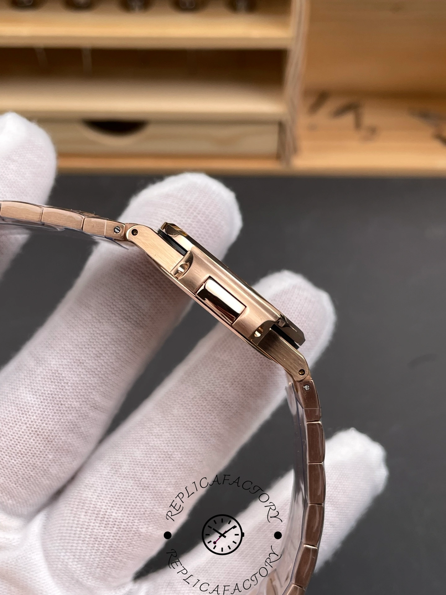 Opposite side of Patek Philippe Nautilus 7010/1R-013 with brushed rose gold finish.