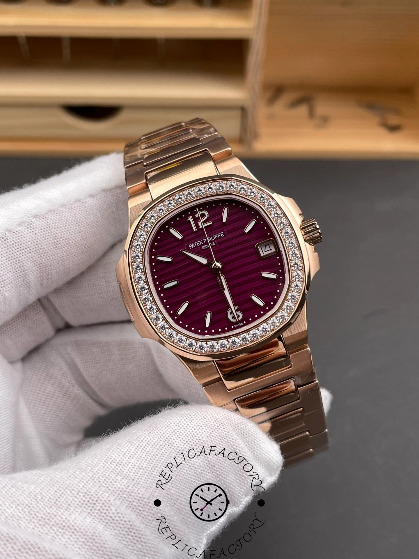 Angled view of Patek Philippe Nautilus 7010/1R-013 highlighting dial texture and gold case.