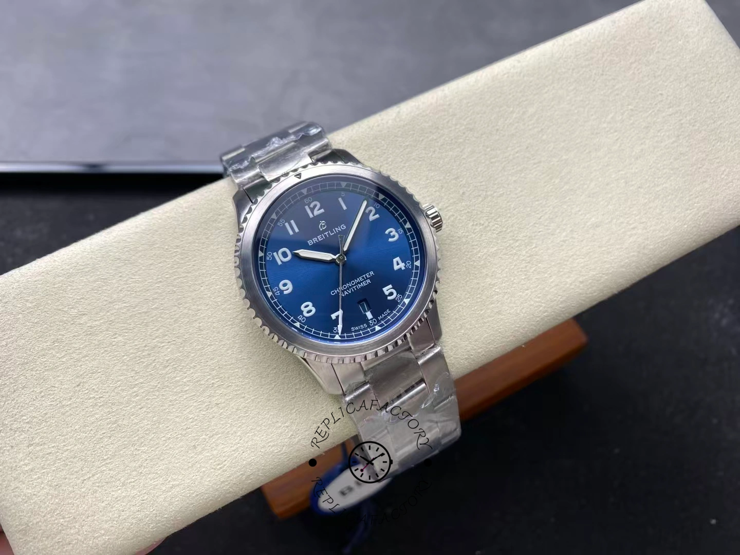 Angled view of Breitling Navitimer 8 A17314101C1A1 highlighting blue dial and case.