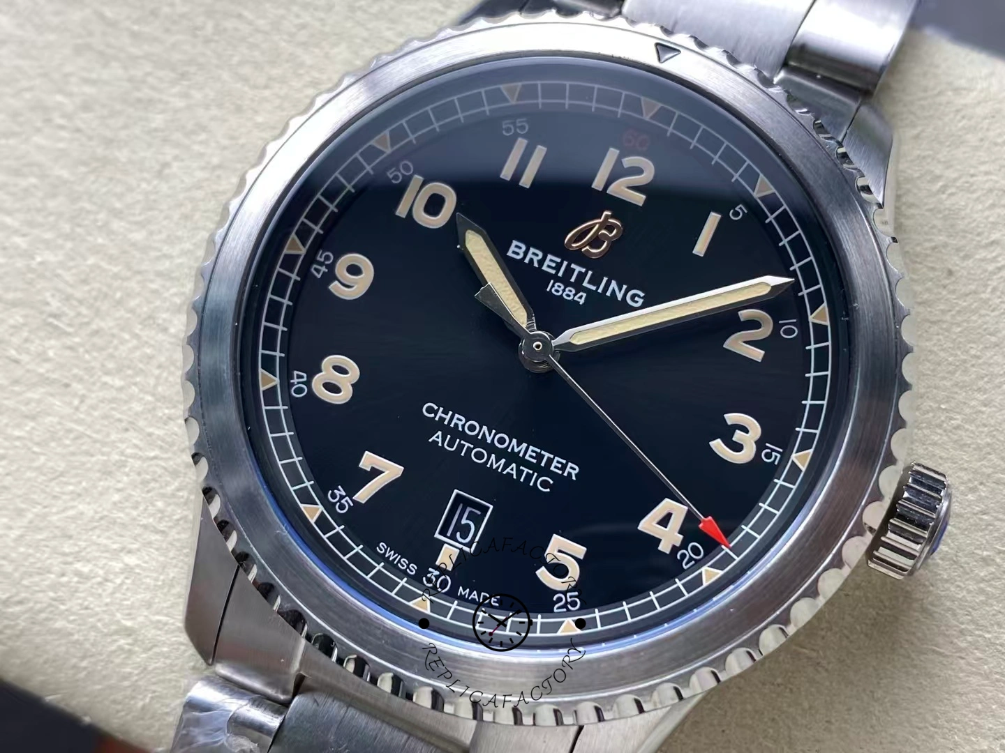 Angled close-up of Breitling Aviator 8 A17315101B1A1 highlighting luminous hands and red-tipped seconds.