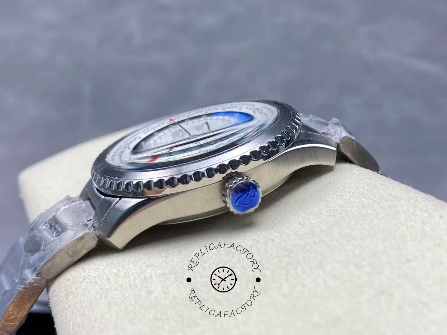 Crown side of Breitling Aviator 8 B35 AB3521U01G1A1 showing blue logo crown and polished case.