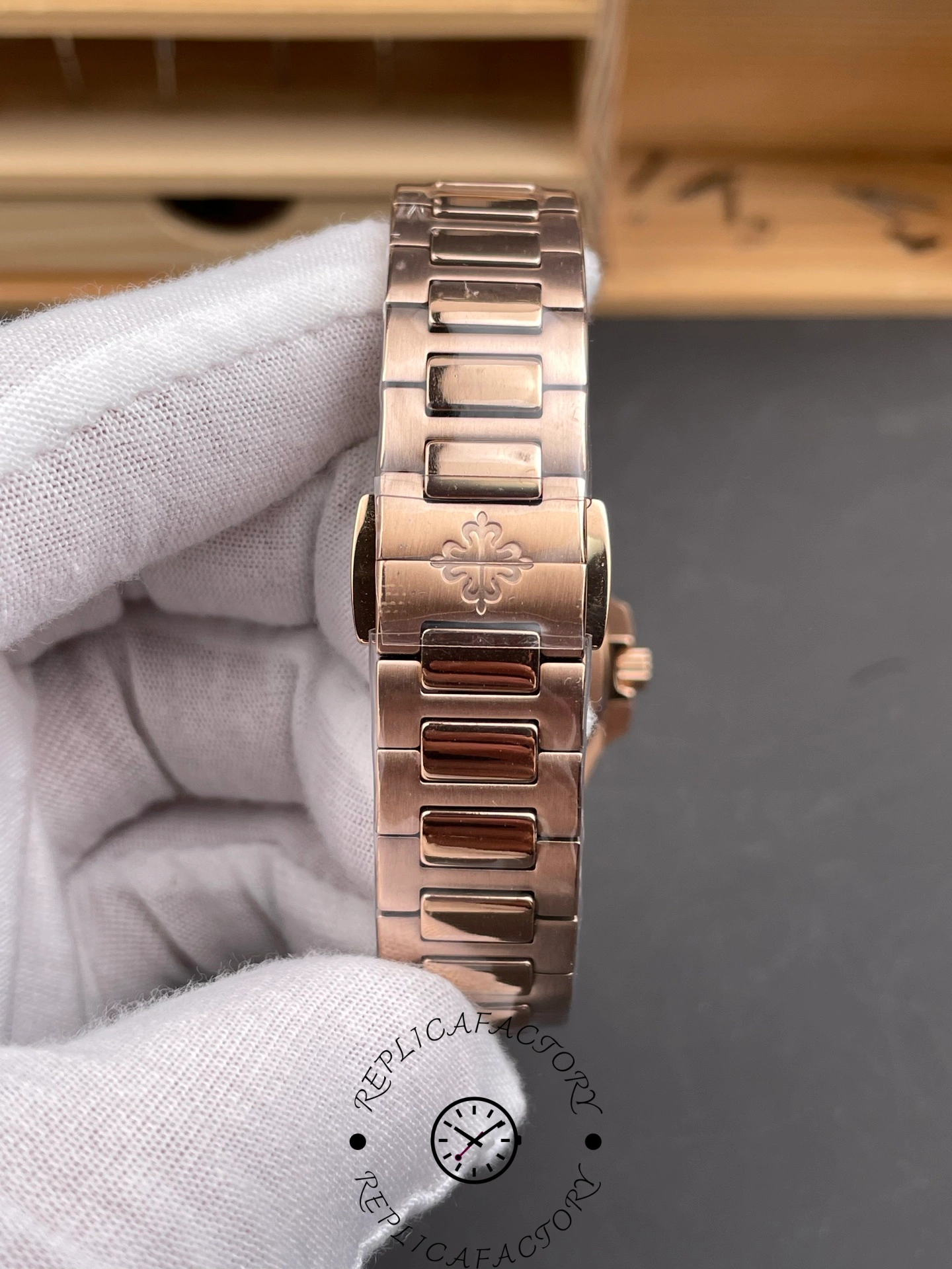 Bracelet of Patek Philippe Nautilus 7010/1R-013 showing Calatrava cross clasp detail.