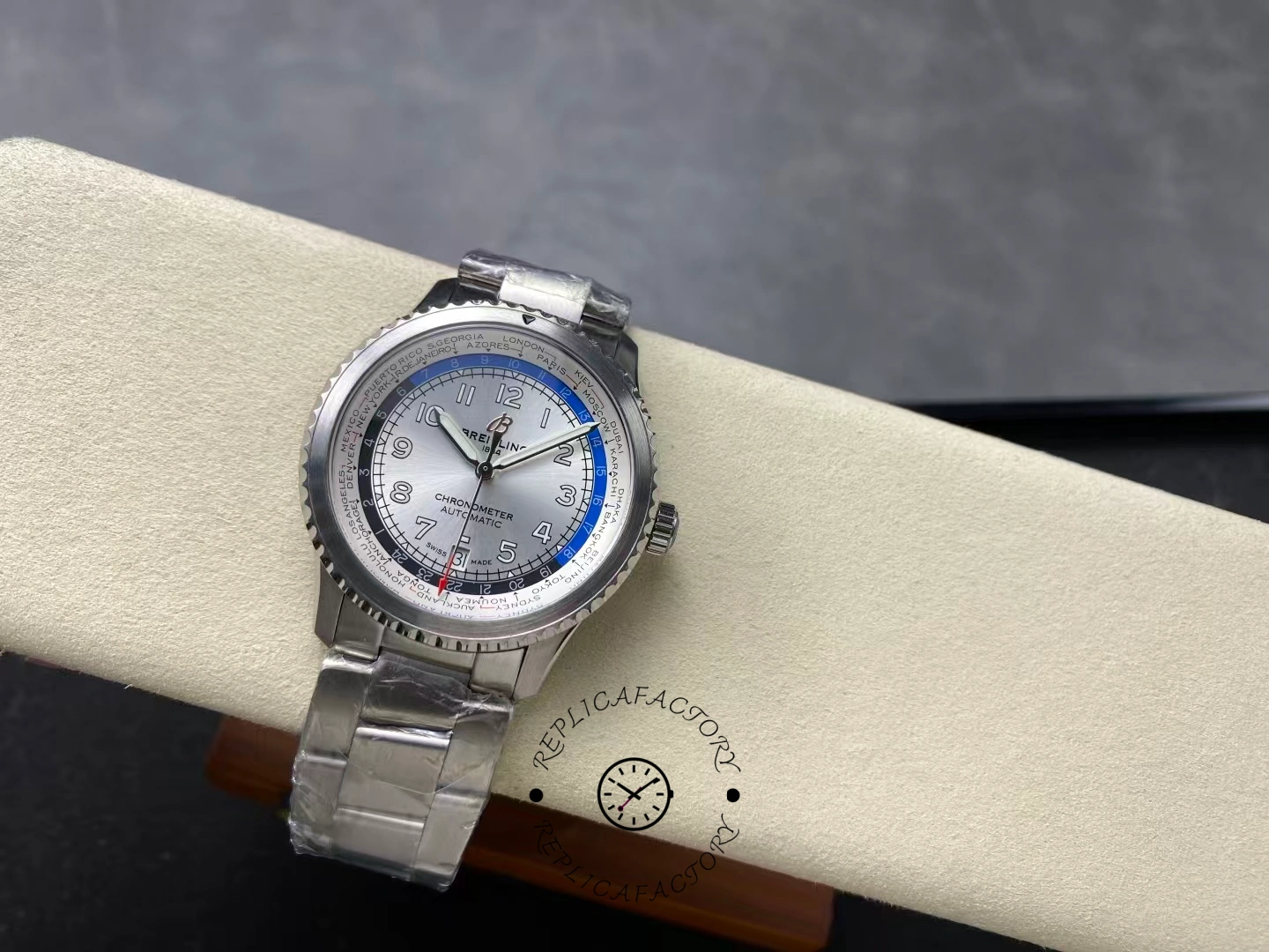 Angled view of Breitling Aviator 8 B35 AB3521U01G1A1 highlighting silver dial and bracelet.