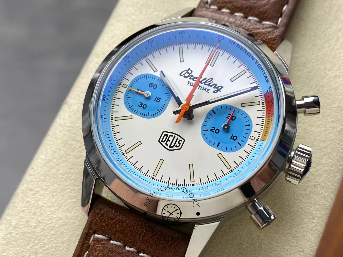 Close-up of Breitling Top Time Deus A233112A1A1X1 white dial with blue subdials.