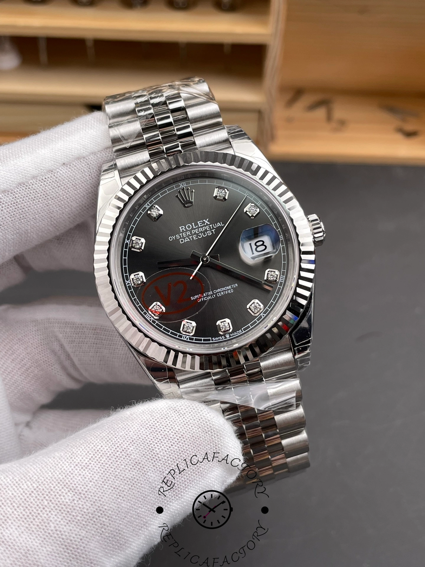 Angled view of Rolex Datejust 41mm m126334-0012 highlighting dial diamonds and date window.