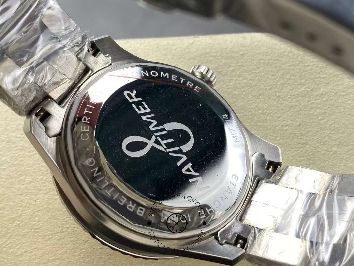 Caseback of Breitling Aviator 8 A17315101C1A1 engraved with Navitimer chronometer details.