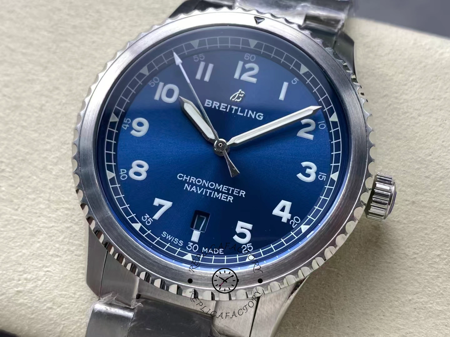 Close-up of Breitling Navitimer 8 A17314101C1A1 blue dial showing luminous numerals.
