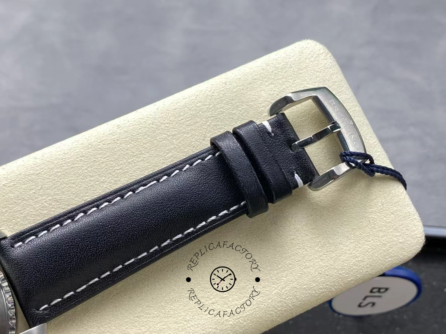 Buckle close-up of Breitling Navitimer 8 Automatic 41 A17314101C1X2 with engraved logo.