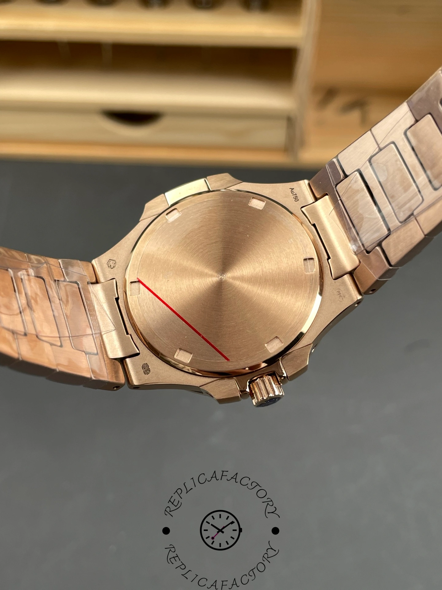 Caseback of Patek Philippe Nautilus 7010/1R-013 with brushed finish and sealed back.