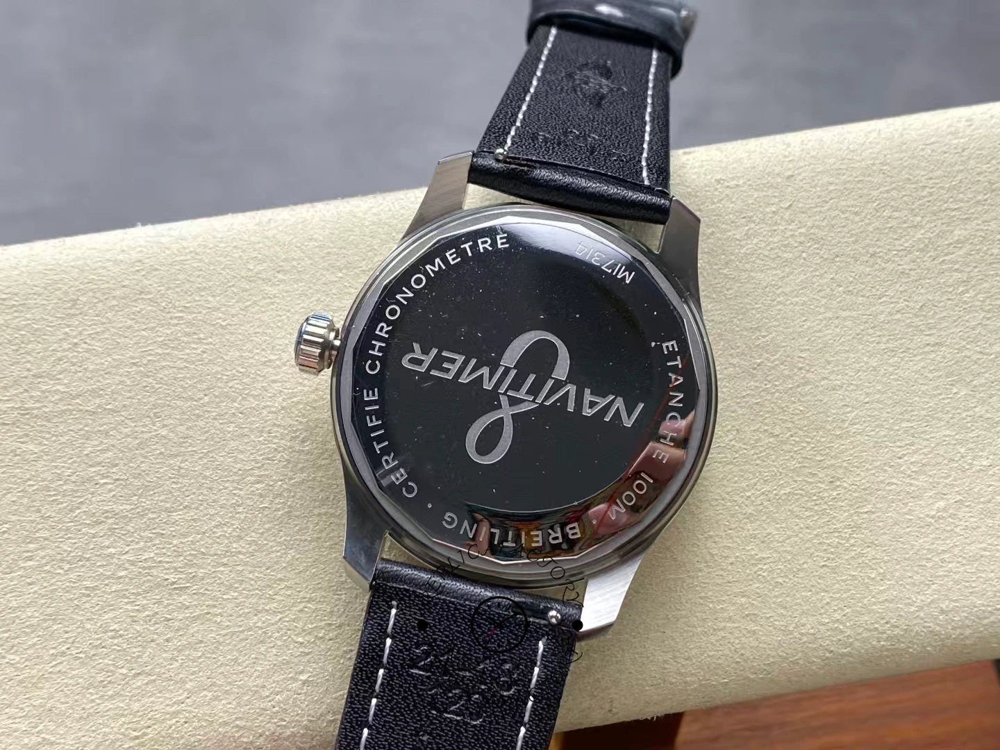 Caseback of Breitling Aviator 8 B35 Unitime 43 AB3521U41B1P1 engraved with NAVITIMER logo.