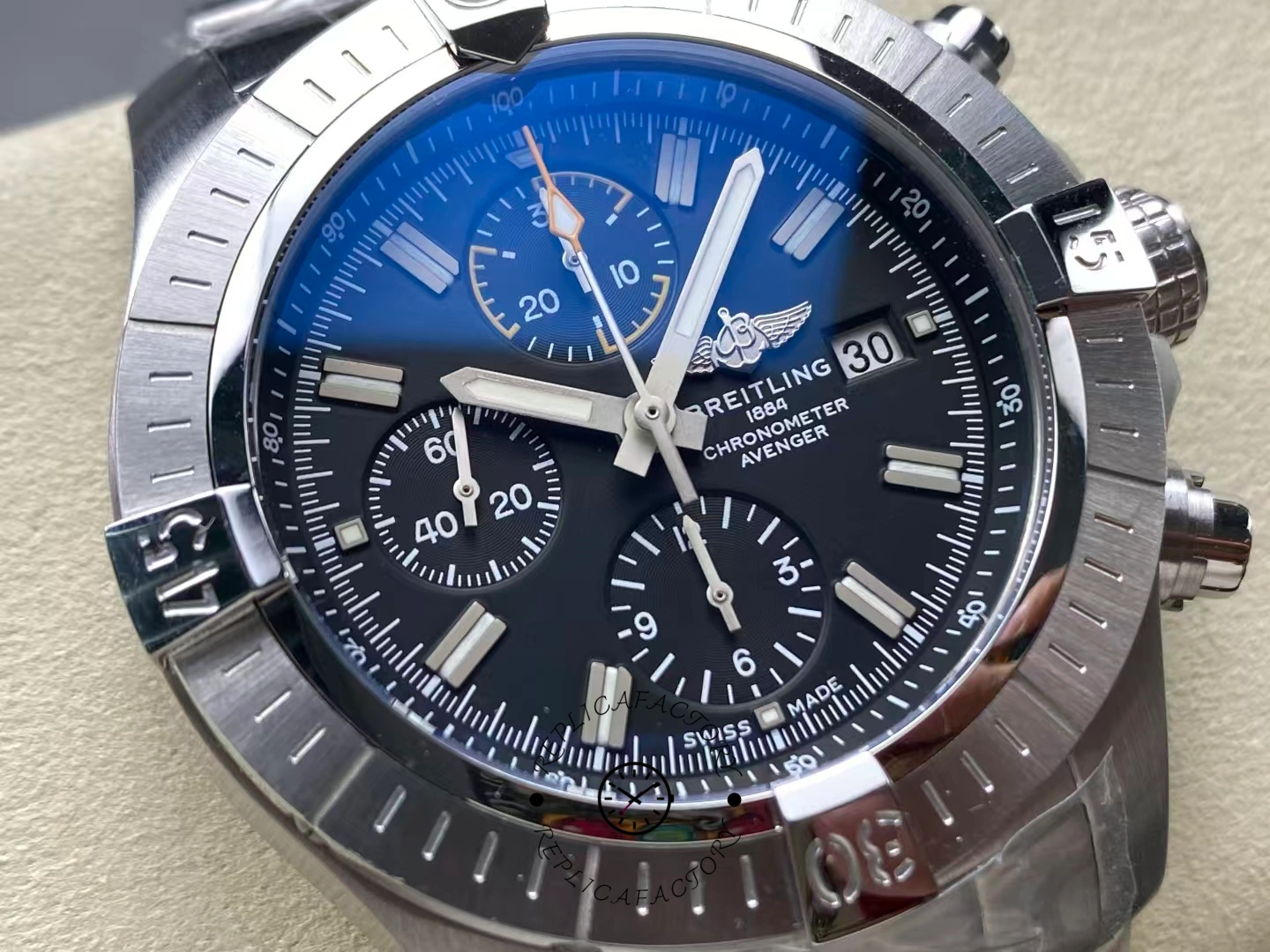 Macro shot of Breitling Avenger Chronograph 45 A13317101B1A1 black dial with yellow second hand.