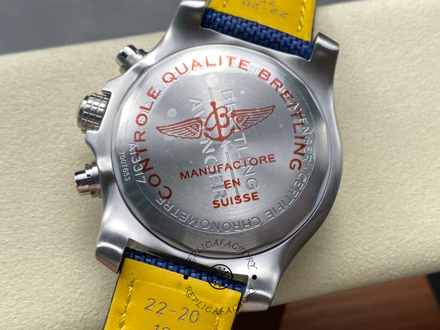 Caseback of Breitling Avenger Chronograph 45 A13317101C1X1 engraved with red text.