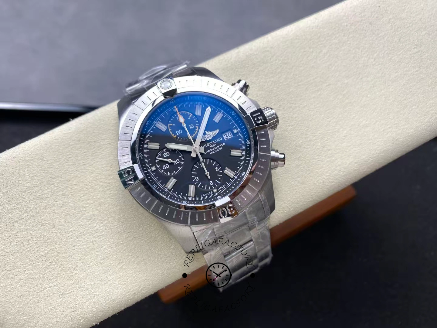 Angled view of Breitling Avenger Chronograph 45 A13317101B1A1 with luminous black dial.