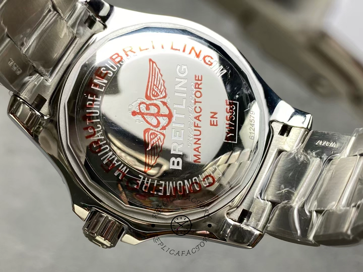 Caseback of Breitling Superocean 44 Special Y1739310BF45 with red engraved logo and text.