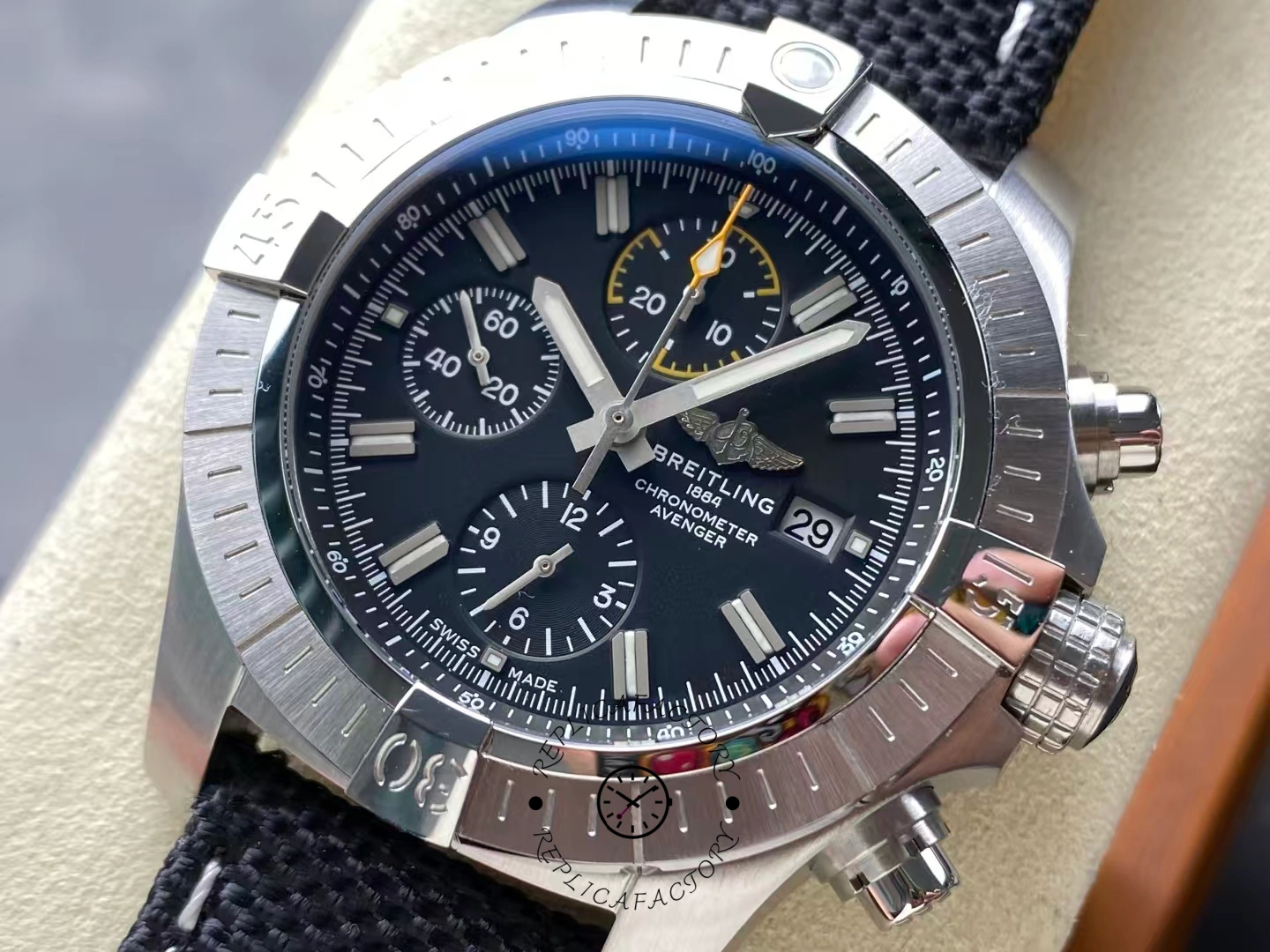 Close-up of Breitling Avenger Chronograph 45 A13317101B1X1 dial showing luminous markers.