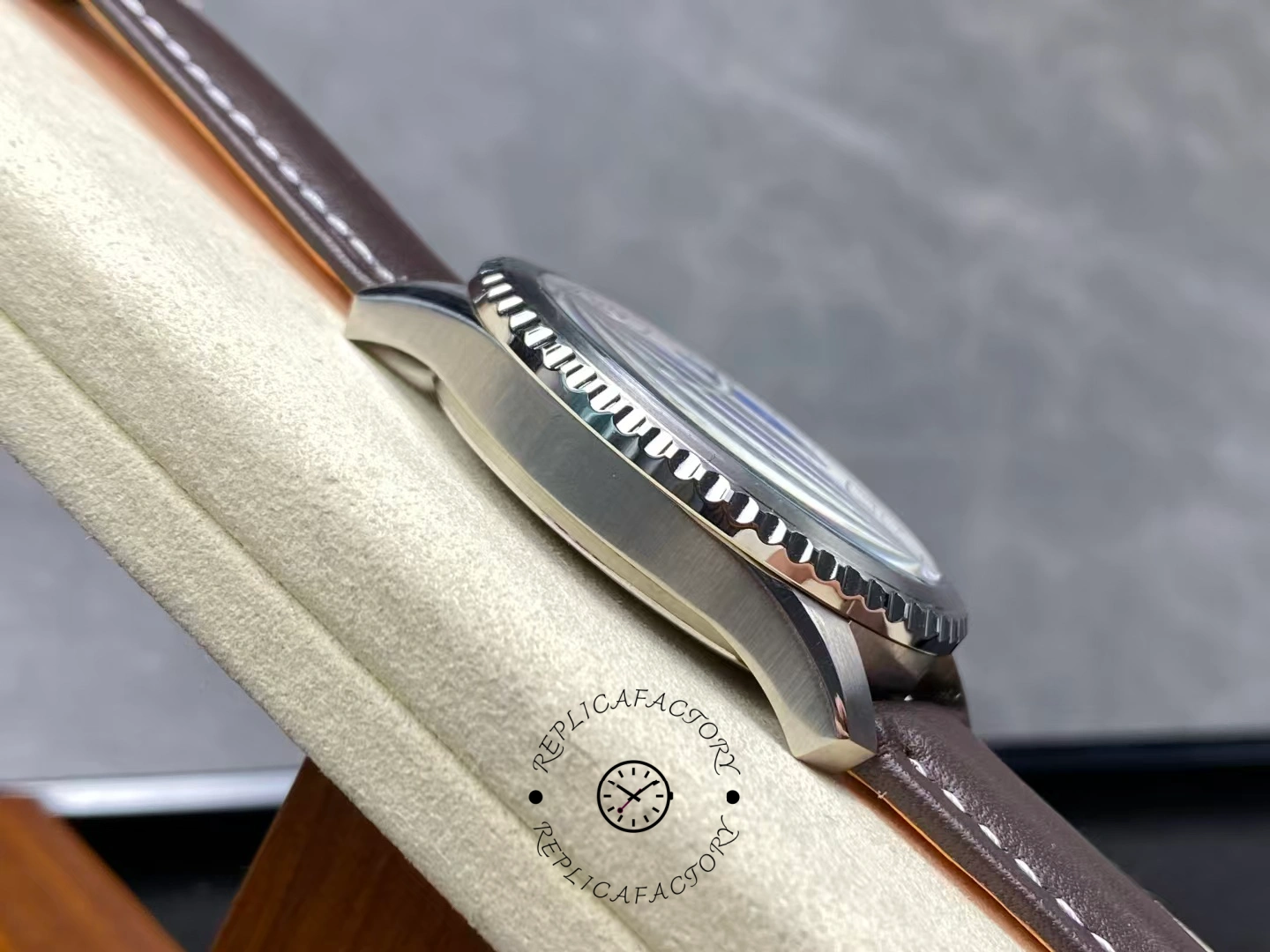 Angled side view of Breitling Aviator 8 B35 Automatic 43 AB3521U01G1P1 showing fluted bezel.