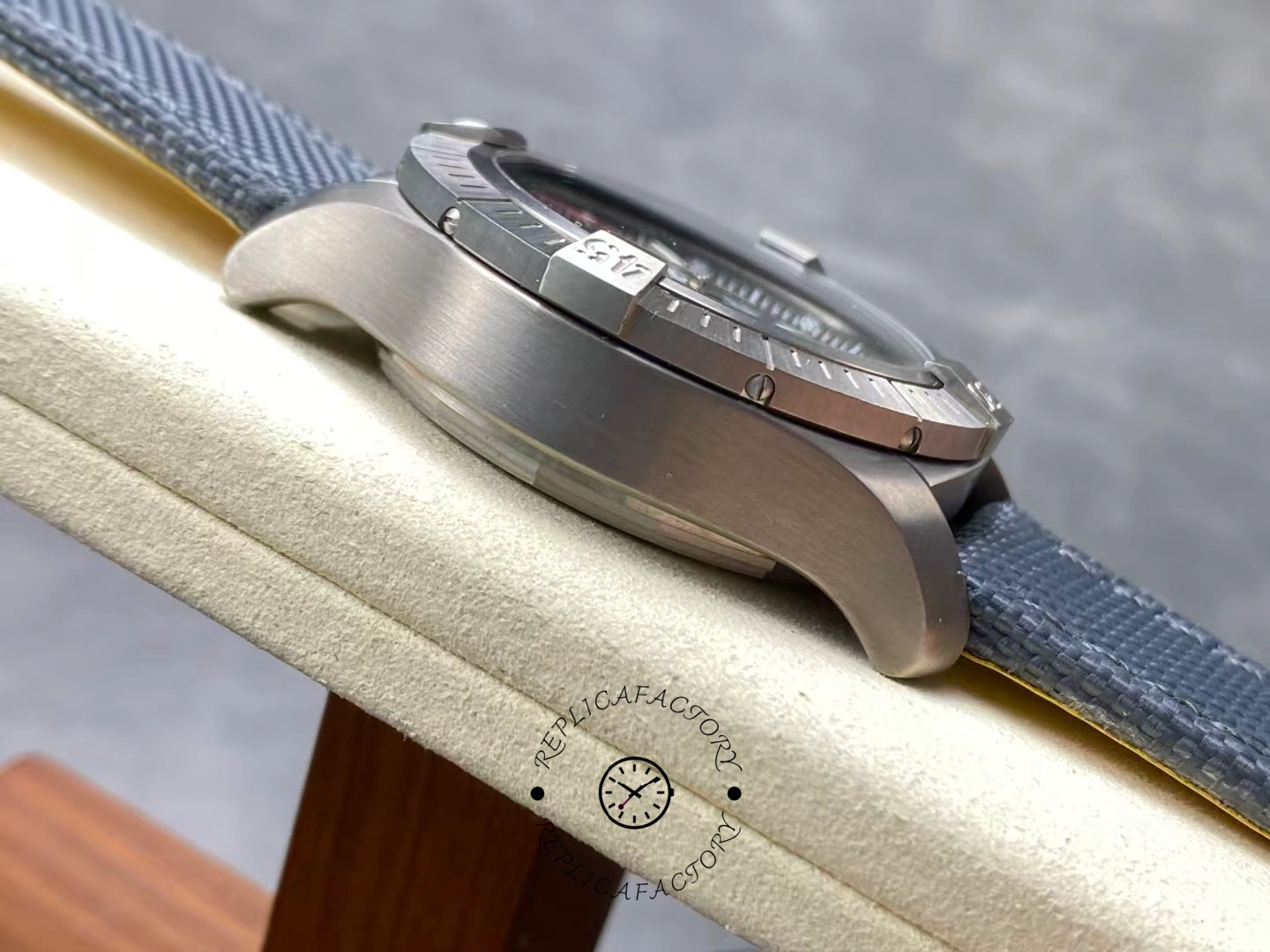 Left side profile of Breitling Avenger Bandit E13383101M1W1 with brushed titanium case.